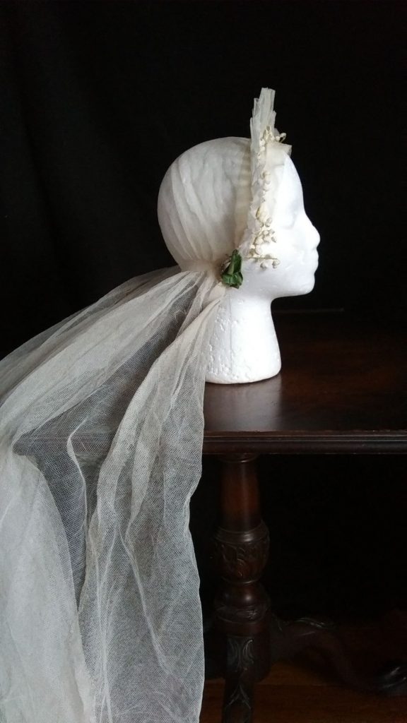 Side view of  cap veil worn by Beatrice, 1936